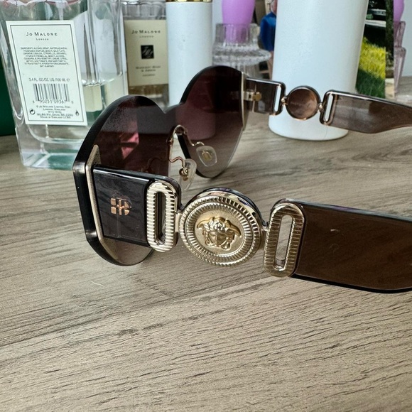 Brown oversized square sunglasses with gradient lenses and thick temple arms